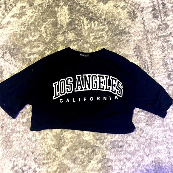SHEIN Tops - I am selling a cropped black t-shirt in a size small with text written on front.